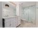 Elegant bathroom with double vanity, hexagon tile floor, and a walk-in shower at 8614 E Valley View Rd, Scottsdale, AZ 85250