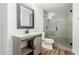 Updated bathroom with walk-in shower and modern vanity at 8614 E Valley View Rd, Scottsdale, AZ 85250