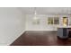 Elegant dining area with dark floors and modern lighting fixtures at 8614 E Valley View Rd, Scottsdale, AZ 85250