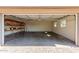 Attached garage with shelving and ample storage space at 8614 E Valley View Rd, Scottsdale, AZ 85250