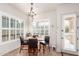 Breakfast nook with table and chairs near kitchen at 8725 E Indigo St, Mesa, AZ 85207