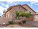 Spanish style home with stone and stucco exterior at 8725 E Indigo St, Mesa, AZ 85207