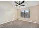 Second bedroom with ceiling fan and window coverings at 9127 W Kimberly Way, Peoria, AZ 85382