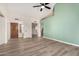 Light and bright entryway with wood flooring and an accent wall at 9127 W Kimberly Way, Peoria, AZ 85382