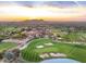 Aerial view of Superstition Mountain Golf Club with sunset views at 9505 E Superstition Mountain Dr, Gold Canyon, AZ 85118