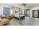 Main bedroom with four-poster bed and sitting area at 9505 E Superstition Mountain Dr, Gold Canyon, AZ 85118