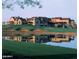 Picturesque clubhouse with reflection in water at 9505 E Superstition Mountain Dr, Gold Canyon, AZ 85118