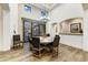 Bright dining room featuring a large round table and wood flooring at 9505 E Superstition Mountain Dr, Gold Canyon, AZ 85118