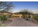 Stunning desert home with a large courtyard and inviting entryway at 9505 E Superstition Mountain Dr, Gold Canyon, AZ 85118