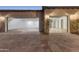 Spacious two-car garage with epoxy flooring at 9505 E Superstition Mountain Dr, Gold Canyon, AZ 85118