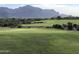 Golf course green with mountain backdrop at 9505 E Superstition Mountain Dr, Gold Canyon, AZ 85118