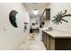 Bright laundry room with washer, dryer and cabinets at 9505 E Superstition Mountain Dr, Gold Canyon, AZ 85118