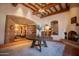 Elegant lobby with fireplace and large table at 9505 E Superstition Mountain Dr, Gold Canyon, AZ 85118