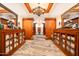 Luxurious locker room with wood cabinets and plush towels at 9505 E Superstition Mountain Dr, Gold Canyon, AZ 85118