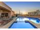 Stunning pool with spa and relaxing patio area at 9505 E Superstition Mountain Dr, Gold Canyon, AZ 85118