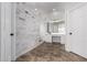 Bathroom with marble shower, vanity, and tile floors at 9745 E Natal Ave, Mesa, AZ 85209