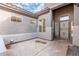 Private courtyard entry with flagstone flooring at 9745 E Natal Ave, Mesa, AZ 85209