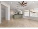 Bright and airy living room with tile floors and ceiling fan at 9745 E Natal Ave, Mesa, AZ 85209