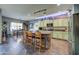 Rustic kitchen with an island, stainless steel appliances, and a farmhouse sink at 9778 E Barley Rd, Florence, AZ 85132