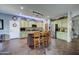 Charming kitchen featuring an island, wood cabinets, and tiled floors at 9778 E Barley Rd, Florence, AZ 85132