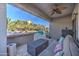 Relaxing patio with seating, overlooking pool and backyard at 9778 E Barley Rd, Florence, AZ 85132