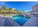 Refreshing blue pool surrounded by a flagstone patio at 9778 E Barley Rd, Florence, AZ 85132