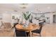 Modern kitchen with white cabinets, stainless steel appliances and an island at 980 Castillo E Dr, Litchfield Park, AZ 85340