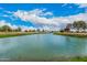 Serene pond with ducks on a sunny golf course at 980 Castillo E Dr, Litchfield Park, AZ 85340