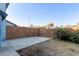 Private backyard with wooden fence and concrete patio at 10101 N 91St Ave # 136, Peoria, AZ 85345