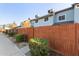 Exterior view of the property with wooden fence at 10101 N 91St Ave # 136, Peoria, AZ 85345