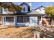 Front view of two-story house with landscaping at 10101 N 91St Ave # 136, Peoria, AZ 85345