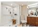 Updated bathroom featuring a new frameless shower and updated vanity at 10206 N 105Th Way, Scottsdale, AZ 85258