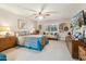 Bedroom with a large bed, neutral walls, and a ceiling fan at 10206 N 105Th Way, Scottsdale, AZ 85258