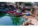 Community boat dock with canoes and kayaks, inviting residents to enjoy water activities at 10206 N 105Th Way, Scottsdale, AZ 85258