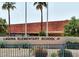 Laguna Elementary School A+ building front with lush greenery and palm trees in a Gathering neighborhood at 10206 N 105Th Way, Scottsdale, AZ 85258