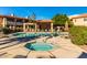 Community pool and spa with covered patio at 10410 N Cave Creek Rd # 2060, Phoenix, AZ 85020