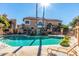 Sparkling community pool with lounge chairs at 10410 N Cave Creek Rd # 2060, Phoenix, AZ 85020