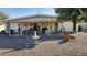 Covered patio, fountain, and gravel landscaping at 10646 W Boswell Blvd, Sun City, AZ 85373