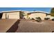 Single-level home with a landscaped front yard and attached garage at 10646 W Boswell Blvd, Sun City, AZ 85373