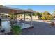 Covered patio with seating area and backyard view at 10646 W Boswell Blvd, Sun City, AZ 85373