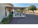 Covered patio with tile flooring and outdoor furniture at 10646 W Boswell Blvd, Sun City, AZ 85373