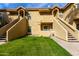 Attractive exterior of a two-story condo building with grassy landscaping at 1126 W Elliot Rd # 1058, Chandler, AZ 85224