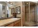 Bathroom with a shower and updated vanity at 11501 E Mark Ln, Scottsdale, AZ 85262