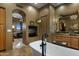 Bathroom with a large soaking tub and views into the bedroom at 11501 E Mark Ln, Scottsdale, AZ 85262