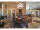 Bright breakfast nook features a round table and four chairs at 11501 E Mark Ln, Scottsdale, AZ 85262