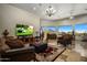 Living room with large windows, fireplace and mountain views at 11501 E Mark Ln, Scottsdale, AZ 85262