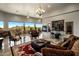 Elegant living room with a fireplace and stunning views at 11501 E Mark Ln, Scottsdale, AZ 85262