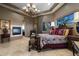 Grand main bedroom featuring fireplace and opulent decor at 11501 E Mark Ln, Scottsdale, AZ 85262