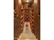 Walk-in wine cellar with extensive storage for wine bottles at 11501 E Mark Ln, Scottsdale, AZ 85262