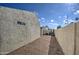 Gravel backyard with stucco walls and cacti at 11616 N 30Th Ln, Phoenix, AZ 85029